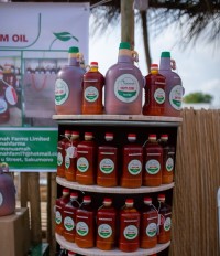 Nuamah Farms' Local Market Selling Setup. Tasty zomi organic palm oil is available in stores, supermarkets, social media and others platforms. Message us for your bottle of pure organic oil now!